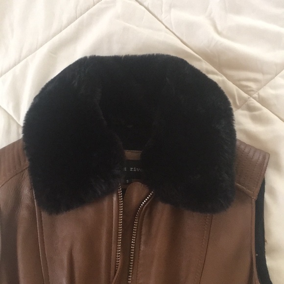 Black Rivet vest size small. - Picture 2 of 3